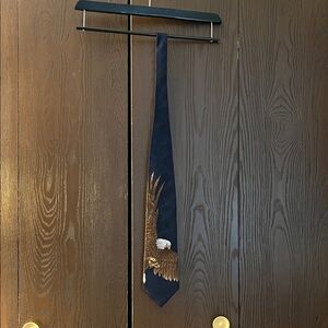 Wembley men’s 100% silk black tie with an eagle.